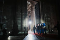 Six carriers of the Air Force and Space carry the cenotaph of Josephine Baker, covered with the French flag, into the Pantheon in Paris, France, Tuesday, Nov. 30, 2021, where she is to symbolically be inducted, becoming the first Black woman to receive France's highest honor. Her body will stay in Monaco at the request of her family. (Thibault Camus/Pool Photo via AP)