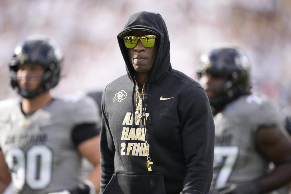 Colorado head coach Deion Sanders heads into the locker room after players warmed up before an NCAA college football game against Southern California, Saturday, Sept. 30, 2023, in Boulder, Colo. (AP Photo/David Zalubowski)