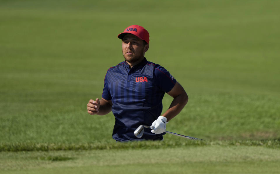 CORRECTS LAST NAME TO SCHAUFFELE FROM SHAUFFELE - Xander Schauffele of the United States watches his shot from the 17th hole during the final round of the men's golf event at the 2020 Summer Olympics on Sunday, Aug. 1, 2021, in Kawagoe, Japan. (AP Photo/Andy Wong)