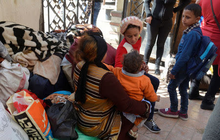 Christian families who left from Al-Arish in the North Sinai Governorate after the escalation of a campaign targeting Christians by Islamic State militants last week, arrive at the Evangelical Church in Ismailia, Egypt February 24, 2017. REUTERS/Ahmed Aboulenein