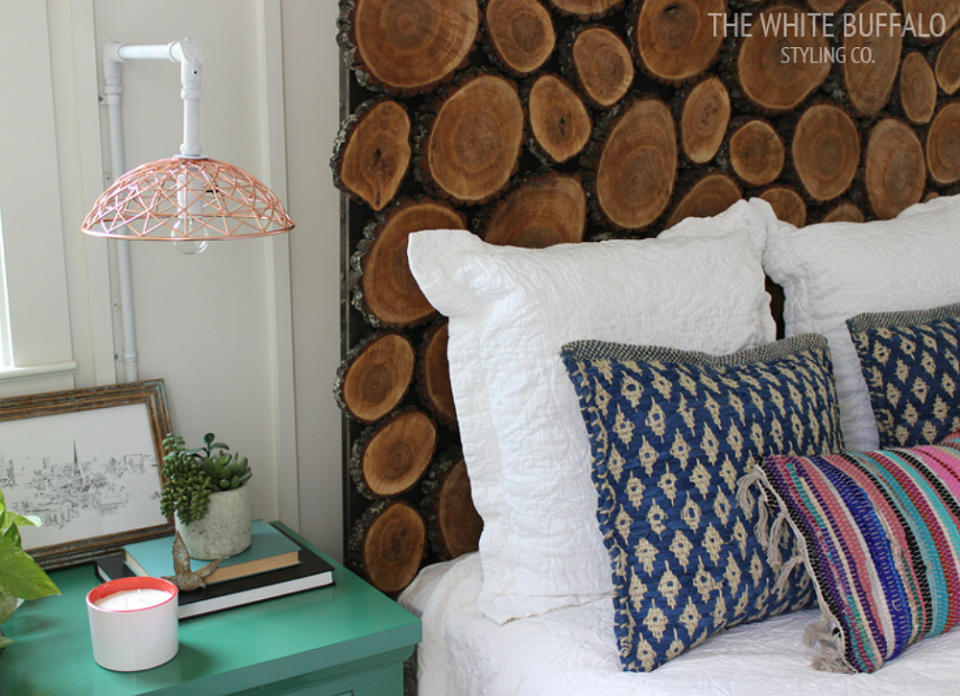 <body> <p>To imbue your space with natural elements, consider crafting this DIY <a rel="nofollow noopener" href=" http://www.bobvila.com/slideshow/9-inventive-ways-to-decorate-with-tree-trunks-branches-and-twigs-47999?bv=yahoo" target="_blank" data-ylk="slk:wood slice;elm:context_link;itc:0;sec:content-canvas" class="link ">wood slice</a> headboard. The trickiest part of assembling the piece is having a little patience, as the wood rounds need to fully dry out before you can even begin. Once they're ready, however, simply arrange and glue the rounds onto stained plywood for a woodsy result that is ideal for any rustic bedroom. </p> <p><strong>Related: <a rel="nofollow noopener" href=" http://www.bobvila.com/slideshow/9-warm-and-cozy-ski-chalets-for-the-21st-century-46404?bv=yahoo" target="_blank" data-ylk="slk:9 Warm and Cozy Ski Chalets for the 21st Century;elm:context_link;itc:0;sec:content-canvas" class="link ">9 Warm and Cozy Ski Chalets for the 21st Century</a> </strong> </p> </body>