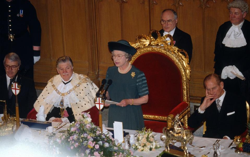LONDON, UNITED KINGDOM - NOVEMBER 24: Queen Elizabeth ll delivers her "Annus Horribilis" speech at the Guildhall and describes her sadness at the events of the year including the marriage breakdown of her two sons and the devastating fire at her home Windsor Castle on November 24, 1992 in London, England. (Photo by Anwar Hussein/Getty Images)