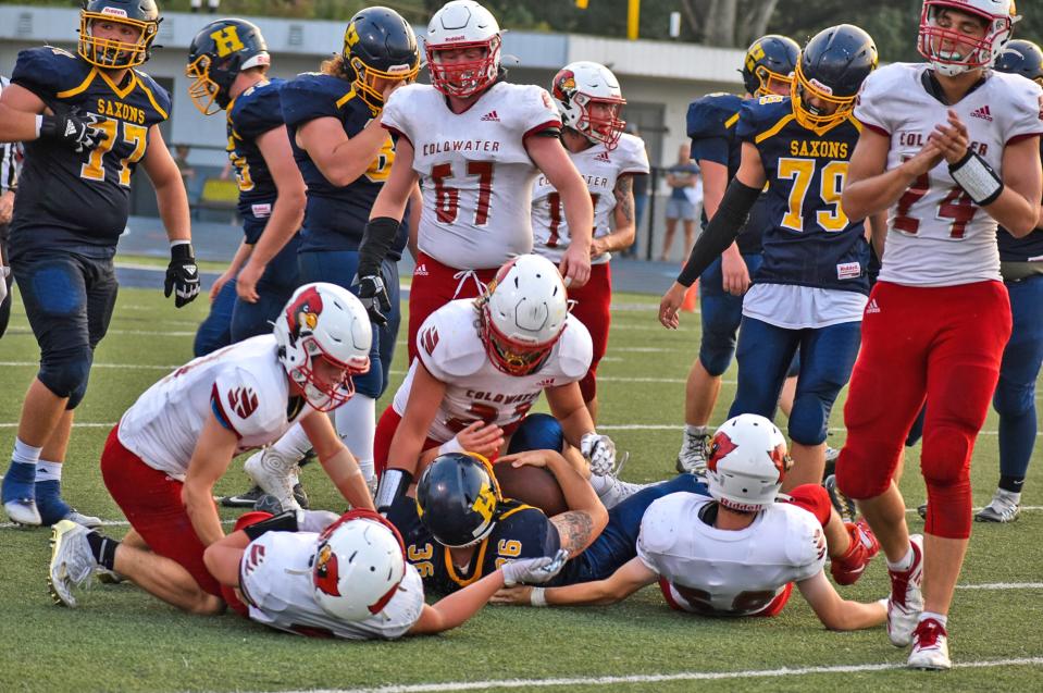 The Coldwater defense brings down a Hastings ball carrier Friday night