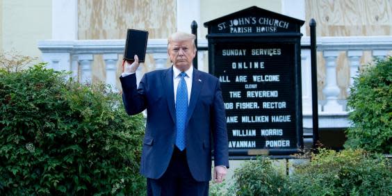 Trump stands outside St John’s Church: (Getty)