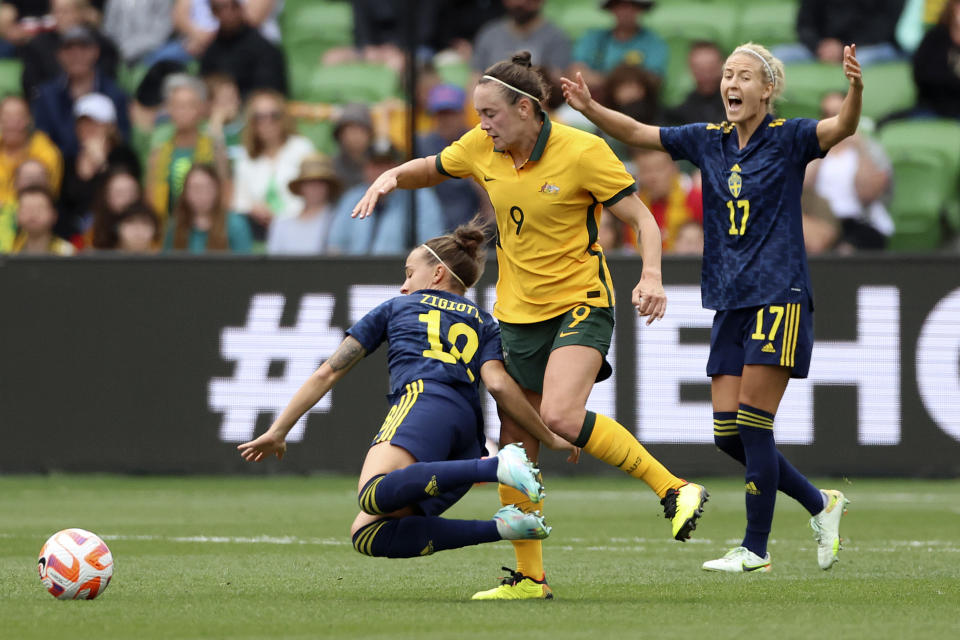 Sweden's Julia Zigiotti Olme, left, and Australia's Caitlin Foord clash during their women's friendly soccer match in Melbourne, Australia, Saturday, Nov. 12, 2022. (Asanka Brendon Ratnayake)