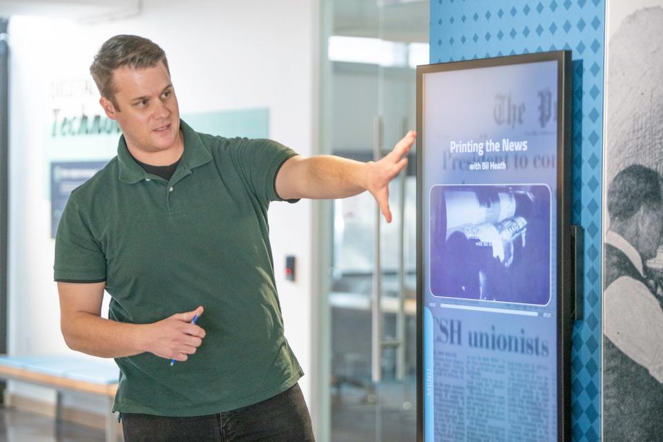Nick Potter, spokesperson for the Pueblo City-County Library District, demonstrates new interactive features of the InfoZone Museum at the Rawlings Library on Wednesday, March 15, 2023.
