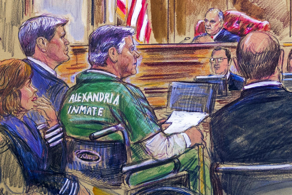 This courtroom sketch depicts former Trump campaign chairman Paul Manafort, center in a wheelchair, during his sentencing hearing in federal court before judge T.S. Ellis III in Alexandria, Va., Thursday, March 7, 2019. Manafort was sentenced to nearly four years in prison for tax and bank fraud related to his work advising Ukrainian politicians, a significant break from sentencing guidelines that called for a 20-year prison term. (Dana Verkouteren via AP)