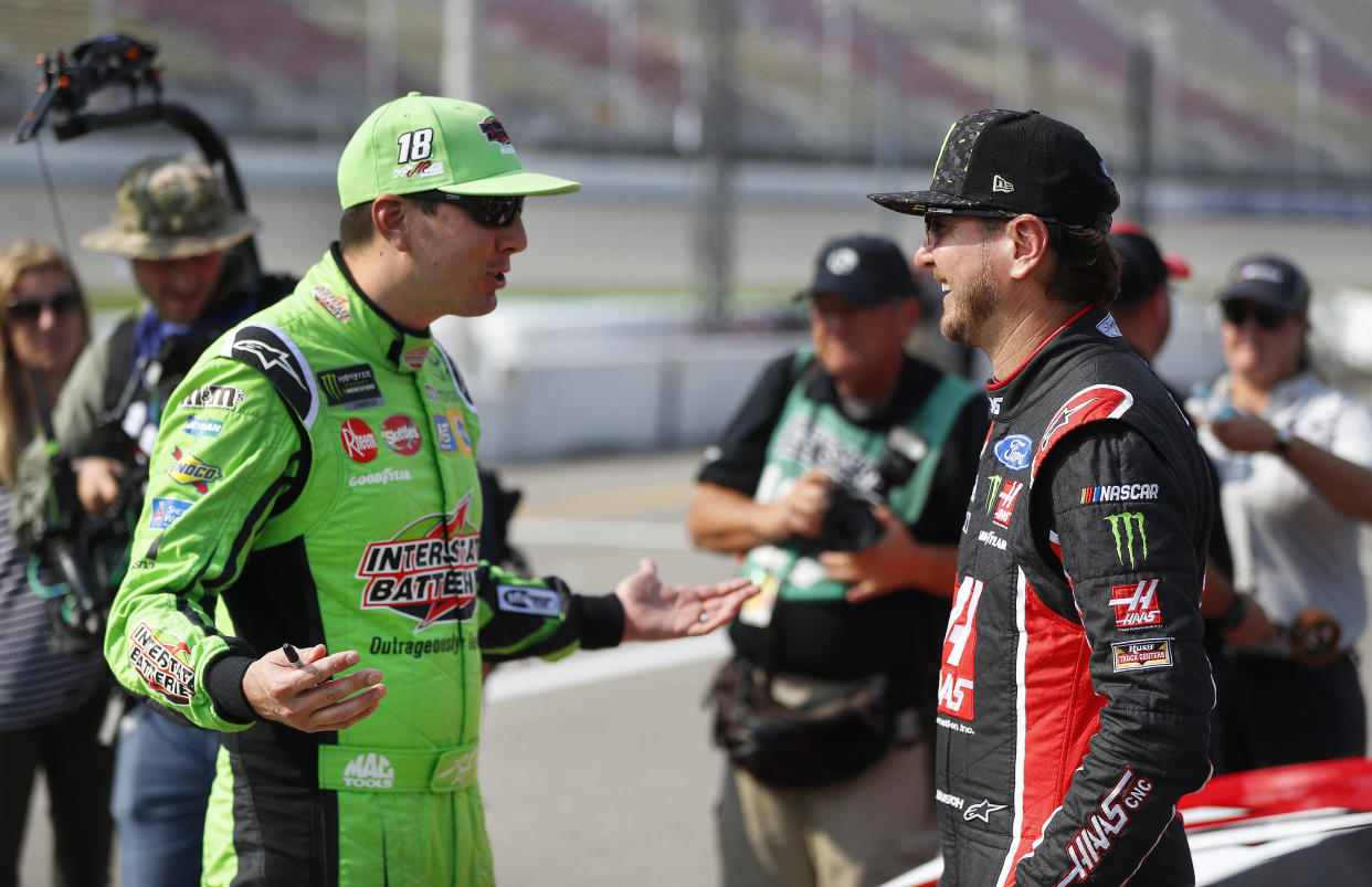 While brother Kyle Busch has six wins in 2018, Kurt Busch (R) is winless so far, though he’s fourth in the points standings. (AP Photo/Paul Sancya)