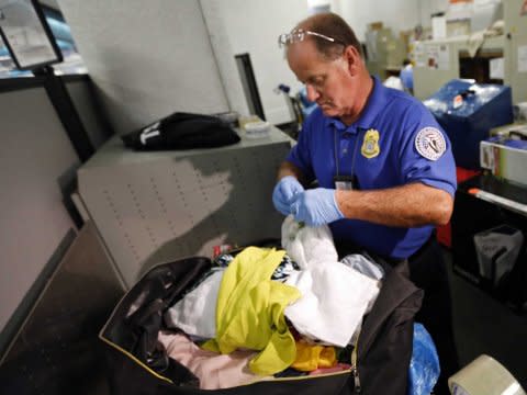 TSA luggage clothing screening