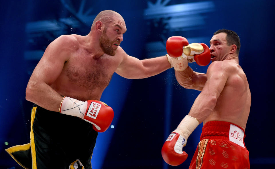 DUESSELDORF, GERMANY - NOVEMBER 28:  Tyson Fury in action with Wladimir Klitschko during their IBF/IBO/WBA/WBO World Heavyweight Championship title fight at Esprit-Arena on November 28, 2015 in Duesseldorf, Germany.  (Photo by Lars Baron/Bongarts/Getty Images)