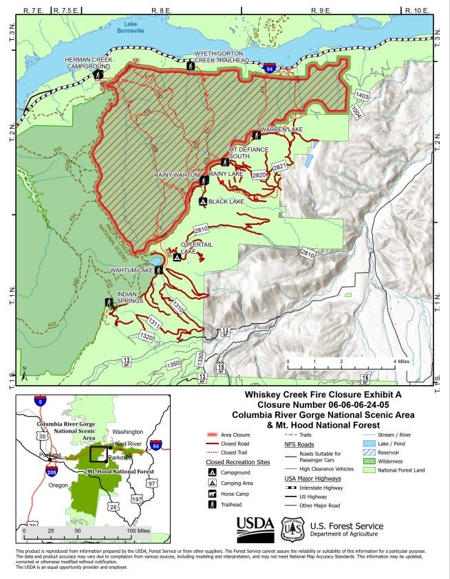 A map shows closures for the Whiskey Creek Fire.