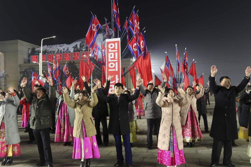 People attend the New Year's eve gala of youth and students at Kim Il Sung Square in Pyongyang, North Korea Sunday, Dec. 31, 2023. (AP Photo/Jon Chol Jin)