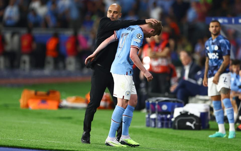 Kevin De Bruyne is embraced by Pep Guardiola - Kevin De Bruyne's Champions League agony strikes again – his pain should hurt any football fan - Getty Images/Francois Nel