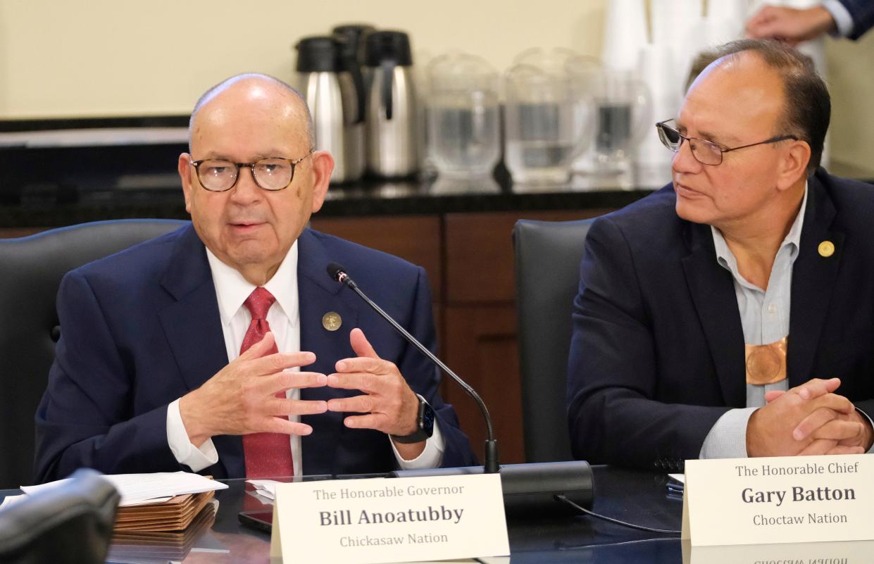 Chickasaw Gov. Bill Anoatubby, left, speaks to lawmakers during a legislative hearing on state-tribal compacts in November. Choctaw Chief Gary Batton also testified.