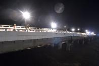 <p>This photo taken on Aug. 29, 2018 shows a flood-damaged bridge near capital Naypyidaw along Yangon to Mandalay highway following floodings from Swar Chaung dam. in Myanmar on Aug. 30, 2018. (Photo: Ye Aung Thu/AFP/Getty Images) </p>