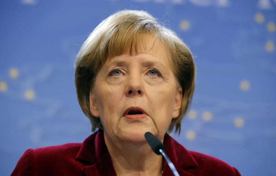 German Chancellor Angela Merkel speaks during a media conference after an EU summit in Brussels on Thursday, March 6, 2014. European Union leaders are holding an emergency summit to decide on imposing sanctions against Russia over its military incursion in Ukraine's Crimean peninsula. (AP Photo/Michel Euler)