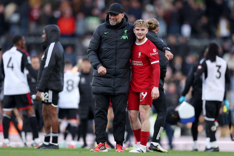 LONDON, ENGLAND - APRIL 21: Jurgen Klopp, Manager of Liverpool, embraces Harvey Elliott of Liverpool after the team's victory in the Premier League match between Fulham FC and Liverpool FC at Craven Cottage on April 21, 2024 in London, England. (Photo by Julian Finney/Getty Images)