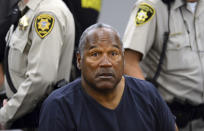 FILE - In this May 14, 2013, file photo, O.J. Simpson sits during a break on the second day of an evidentiary hearing in Clark County District Court in Las Vegas. O.J. Simpson's attorney Malcolm LaVergne is now handling the deceased former football star, actor and famous murder defendant's financial estate. (AP Photo/Ethan Miller, Pool, File)