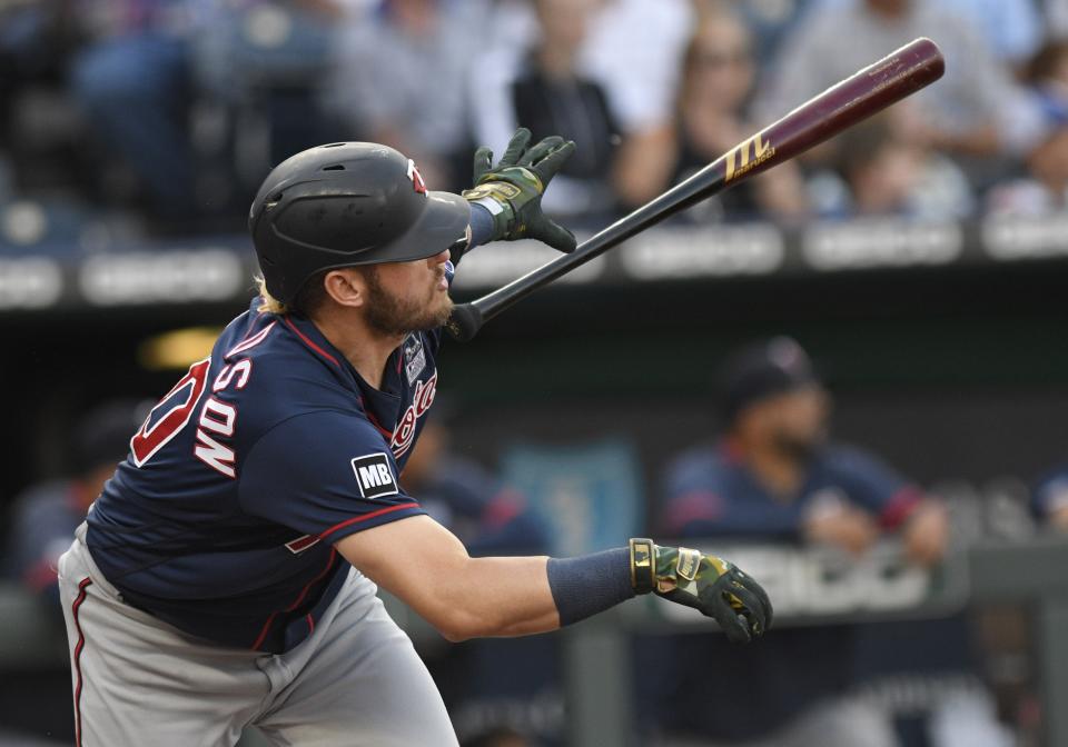 Minnesota Twins' Josh Donaldson tosses his bat after hitting a solo home run during the first inning of the team's baseball game against the Kansas City Royals, Thursday, June 3, 2021, in Kansas City, Mo. (AP Photo/Reed Hoffmann)