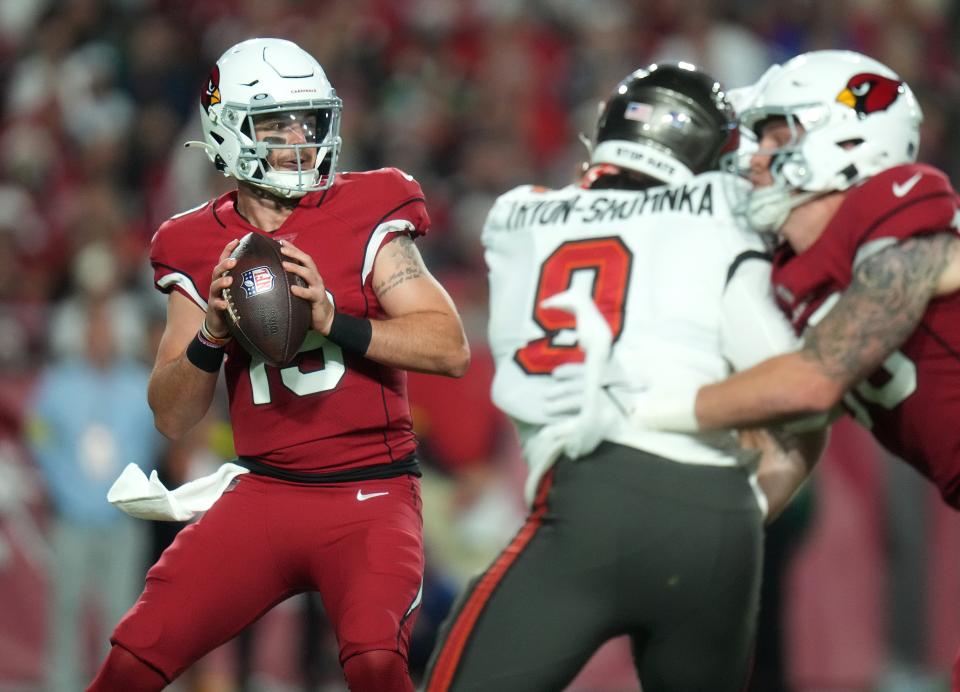 Dec 25, 2022; Glendale, Arizona, USA; Arizona Cardinals quarterback Trace McSorley (19) looks to throw the ball against the Tampa Bay Buccaneers at State Farm Stadium. Mandatory Credit: Joe Rondone-Arizona Republic