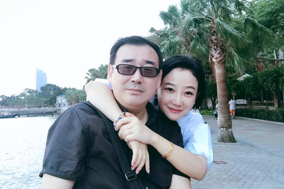 FILE - This undated, file photo released by Chongyi Feng shows Yang Hengjun and his wife Yuan Xiaoliang. Australia says its citizen Yang Hengjun will be tried on espionage charges on Thursday, May 27, amid deteriorating relations between the two countries. Yang has been held since arriving in China in January 2019 and has had no access to family and only limited contact with his legal representation, according to a statement from Australian Foreign Minister Marise Payne.(Chongyi Feng via AP, File)