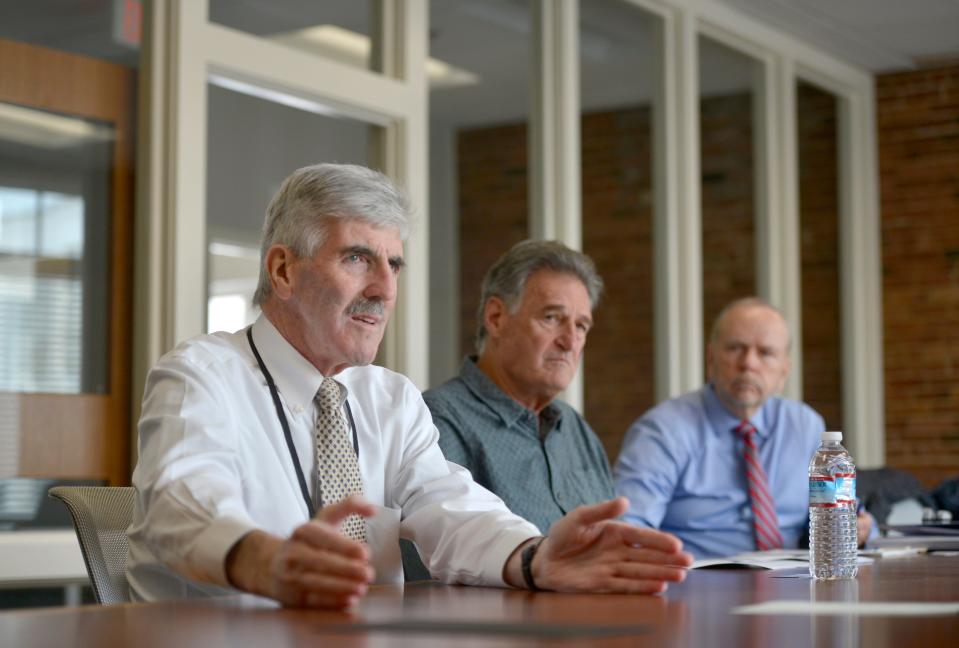 "If it doesn’t happen now, it never will," said Cape Cod Regional Transportation Authority Administrator Thomas Cahir on the Bourne Rail Trail initiative, where $20 million is pending for the 'rail-to-trail' design. Cahir, left, was joined by Friends of the Bourne Rail Trail President Ken Cheitlin, center, and Cape Cod Regional Transportation Authority Chief Financial Officer Henry Swiniarski, on Thursday at the Cape Cod Times office in Hyannis.