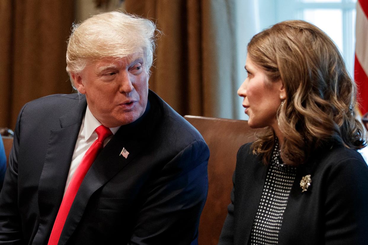 In this Dec. 12, 2018 file photo, President Donald Trump speaks to then-Gov.-elect Kristi Noem, R-S.D., during a meeting at White House in Washington.