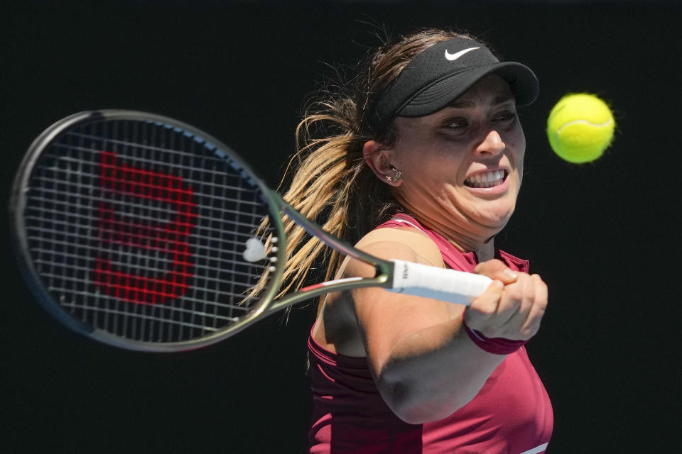 Paula Badosa of Spain plays a forehand return to Madison Keys of the U.S. during their fourth round match at the Australian Open tennis championships in Melbourne, Australia, Sunday, Jan. 23, 2022. (AP Photo/Simon Baker)