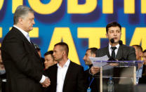 Ukraine's President and presidential candidate Petro Poroshenko attends a policy debate with his rival, comedian Volodymyr Zelenskiy, at the National Sports Complex Olimpiyskiy stadium in Kiev, Ukraine April 19, 2019. REUTERS/Valentyn Ogirenko