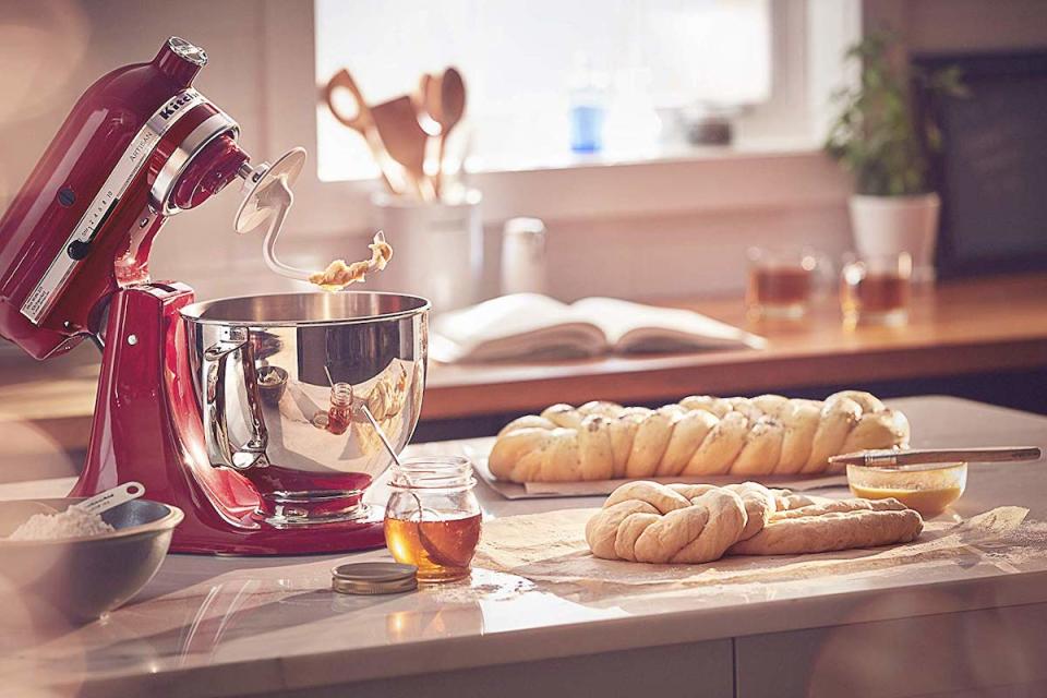 Is there a more iconic holiday kitchen scene than an Empire Red Kitchenaid churning out dough for a festive feast? We think not. (Photo: Amazon)