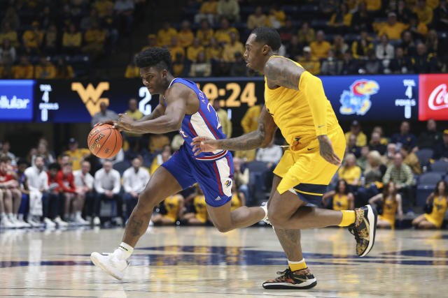 Dick, Wilson, Adams lead No. 3 Kansas over WVU 76-62