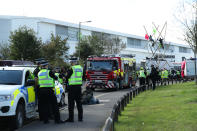 Police and fire services outside the Newsprinters printing works at Broxbourne, Hertfordshire, protesters continue to use bamboo lock-ons and vans to block the road. (Photo by Yui Mok/PA Images via Getty Images)