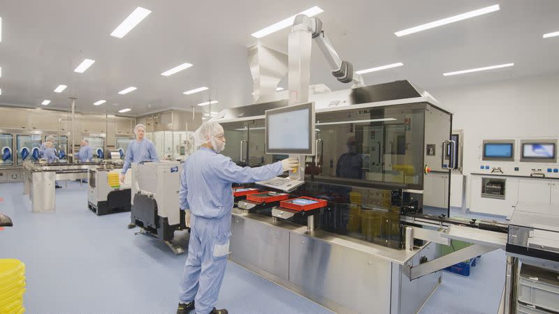 FILE PHOTO: Employees work in the manufacturing of Pfizer’s new respiratory syncytial virus (RSV) vaccine Abrysvo