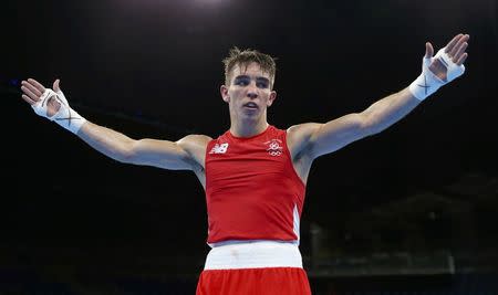 2016 Rio Olympics - Boxing - Preliminary - Men's Bantam (56kg) Round of 16 Bout 177 - Riocentro - Pavilion 6 - Rio de Janeiro, Brazil - 14/08/2016. Michael Conlan (IRL) of Ireland reacts after his bout. REUTERS/Peter Cziborra