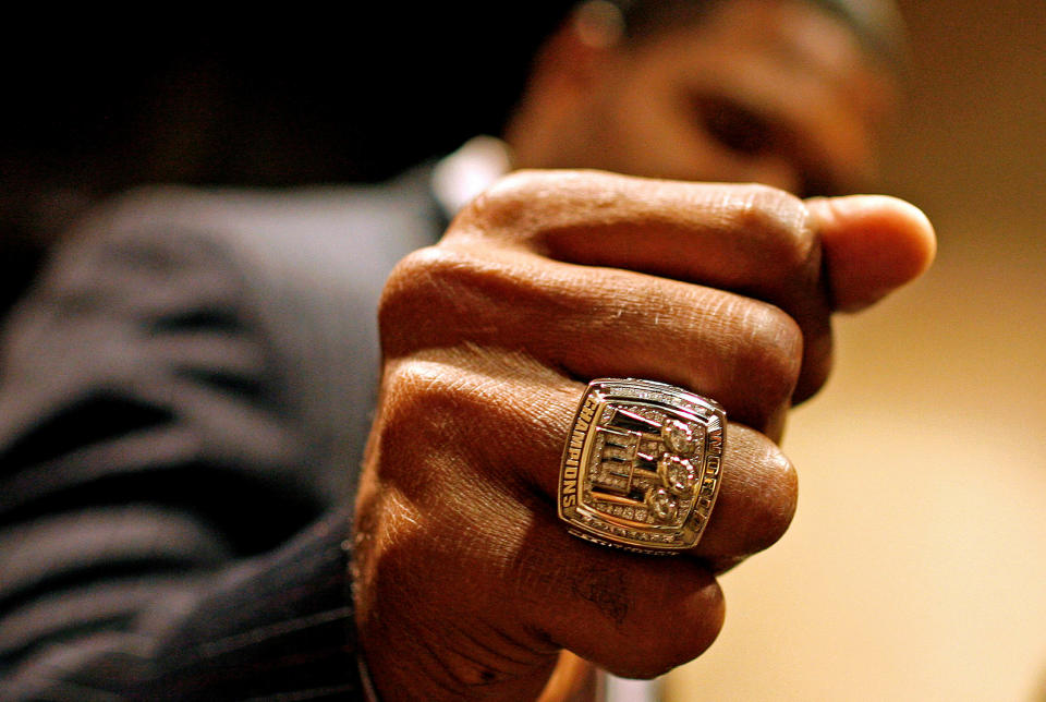 New York Giants defensive end Michael Strahan shows off his ring from Super Bowl XLII. (AP)