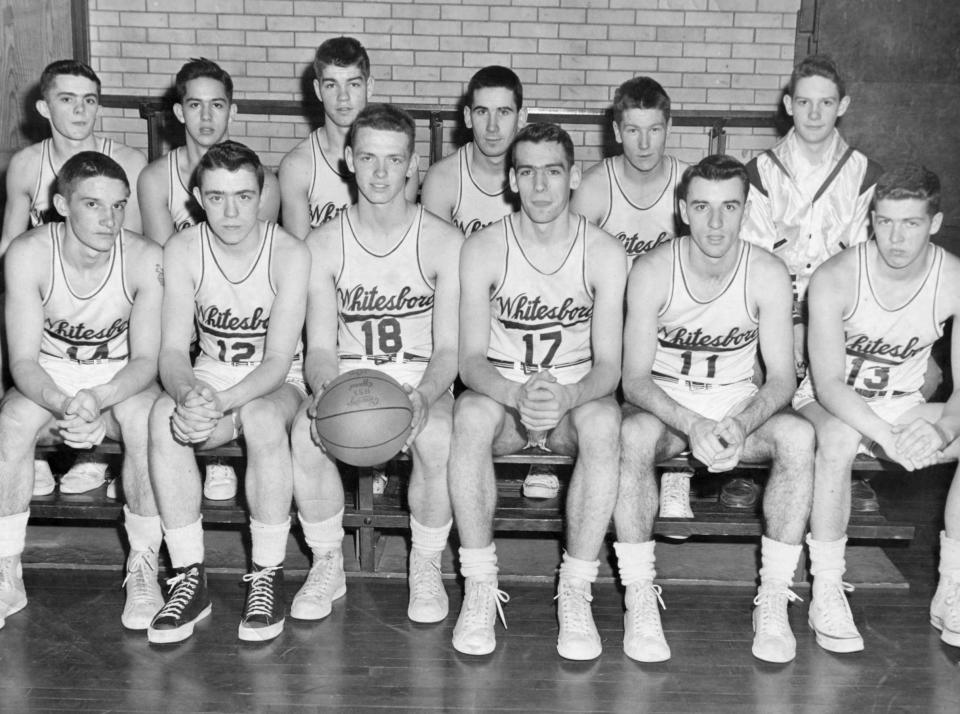 A capacity crowd of more than 2,000 fans crowded into the Utica Free Academy gym on March28, 1952 (another 500 were turned away) to see the Whitesboro Central School basketball team defeat Solvay, 56 to 47, and capture the Section 3 Championship. Solvay—representing the Syracuse-Watertown area—had won 21 in a row. Whitesboro—called The Unbeatables”—won 40 straight and were coached by Allen Frye. The win against Solvay earned Whitesboro the Don Risley Trophy, donated by the District Board of Approved Basketball Officials. The players, front row from the left: Henry Haas, Herbert Ogden, Richard Stofle, Ronald Hovey (who scored 21 points against Solvay), James Weaver and Richard Farmer. Back row from the left: Louis La Grand, Robert Wheeler, John Malloy, George Herthum, James Britt and Manager Thomas Farrell.