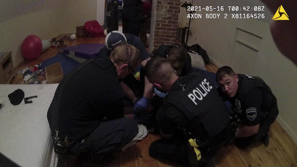 This image provided by American Civil Liberties Union of Vermont shows Burlington Police Department body cam footage of a police interaction with a Black teen late evening on May 15, 2021 in Burlington, Vt. A mother wanted to teach her then 14-year-old son a lesson after he stole electronic cigarettes from a gas station so she called police. A lawsuit by the mother alleges the Burlington police used excessive force and discriminated against her unarmed son. (Burlington Police Department/American Civil Liberties Union of Vermont via AP)