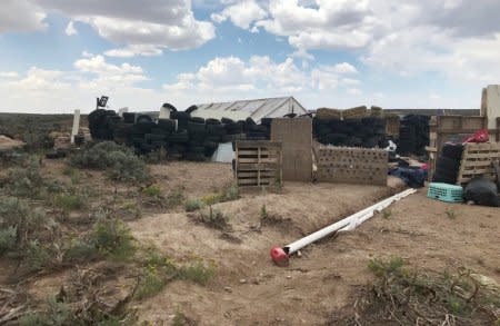 A view of the compound in rural New Mexico where 11 children were taken in protective custody after a raid by authorities near Amalia, New Mexico, August 10, 2018.  Photo taken August 10, 2018.  REUTERS/Andrew Hay