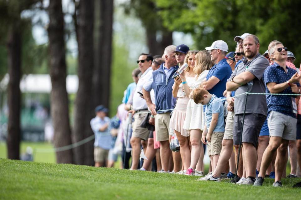 Fans watch during round one of the Wells Fargo Championship at Quail Hollow Club in Charlotte, N.C., on Thursday, May 9, 2024.