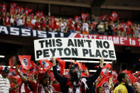 ATLANTA, GA - SEPTEMBER 17: An Atlanta Falcons fan holds a sign up that reads, "This Ain't No Peyton Place." prior to a game between the Atlanta Falcons and the Denver Broncos at the Georgia Dome on September 17, 2012 in Atlanta, Georgia. (Photo by Kevin C. Cox/Getty Images)