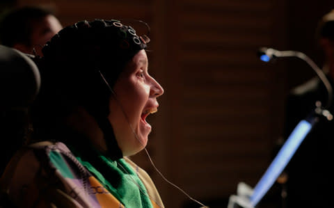 Violinist Rosemary Johnson controlling the music with her brain - Credit: Plymouth University 