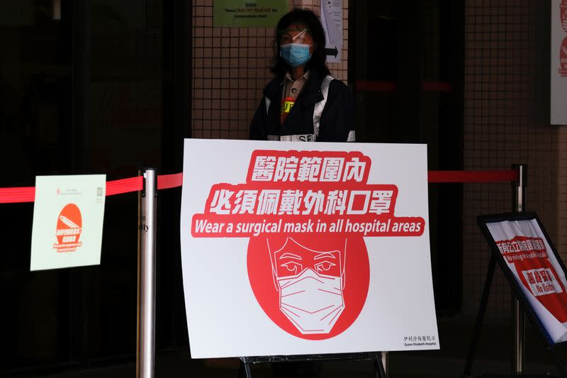 Health warning signs are seen outside Queen Elizabeth Hospital following the outbreak of a new coronavirus, in Hong Kong
