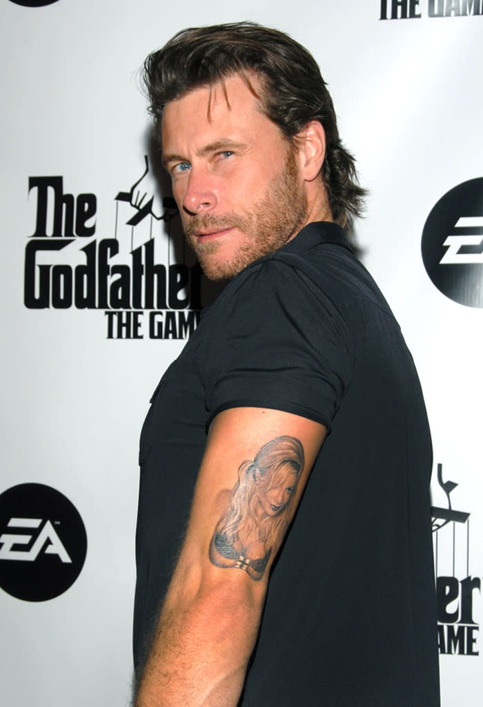 If Dean McDermott ever splits from wife Tori Spelling, he's going to have a hard time getting a date since the "90210" actress' portrait (and bust) is plastered across his arm. And it's not the only piece of body art he has in honor of Tori. While the two were still engaged, Dean got "Truly, Madly, Deeply Tori" inked on his right wrist. Whatever happened to just writing love notes?
