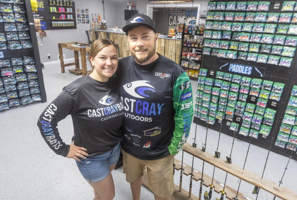 Rick and Mandy Provence, owners of Cast Cray Outdoors in Sebring, stand in the shop that opened in May.