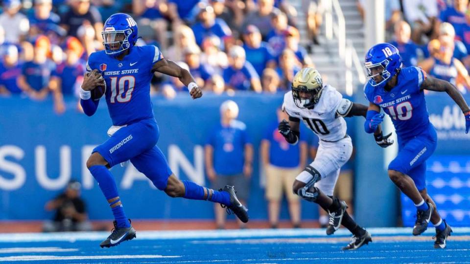 Boise State quarterback Taylen Green runs for a first down in the 2nd quarter against UCF in the Broncos’ home opener, Saturday, Sept. 9, 2023.