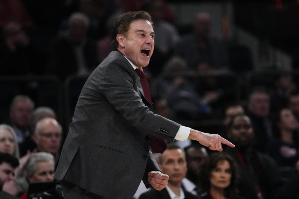 St. John's head coach Rick Pitino calls to his team during the first half of an NCAA college basketball game against Michigan, Monday, Nov. 13, 2023, in New York. (AP Photo/Frank Franklin II)