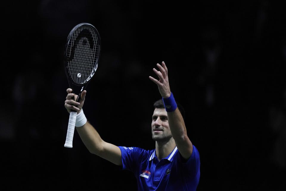 Serbia's Novak Djokovic celebrates after defeating Croatia's Marin Cilic during their Davis Cup tennis semi-final match at Madrid Arena in Madrid, Spain, Friday, Dec. 3, 2021. (AP Photo/Bernat Armangue)