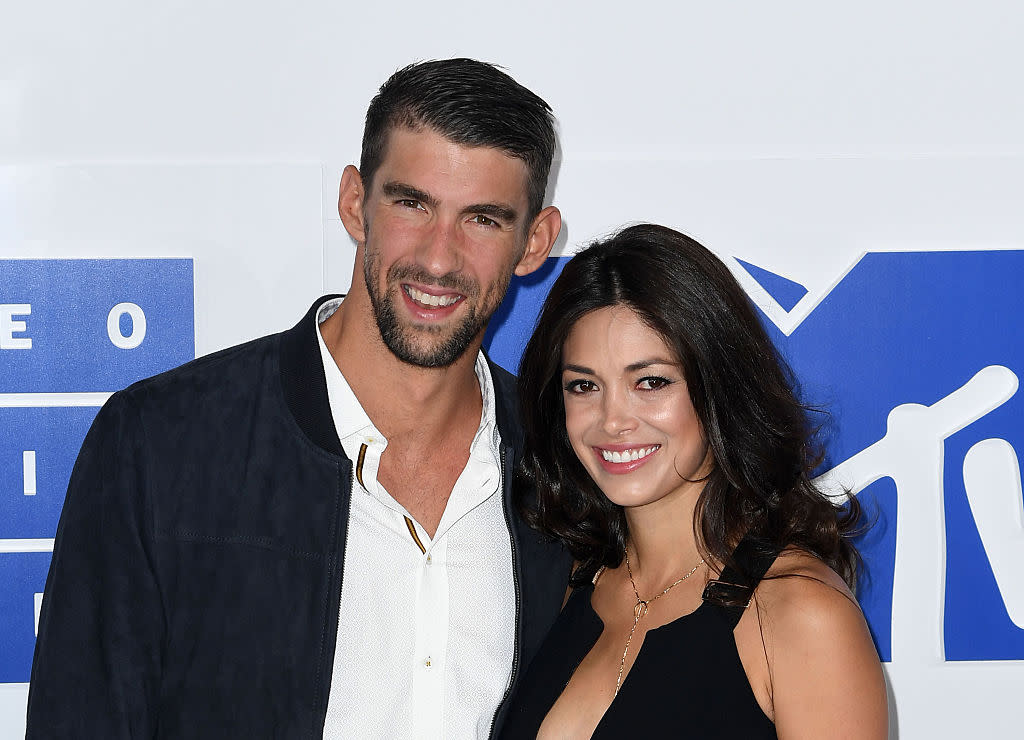 Michael Phelps and wife Nicole Johnson had a second wedding ceremony and the pics are GORGEOUS