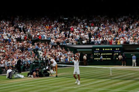 Tennis - Wimbledon - All England Lawn Tennis and Croquet Club, London, Britain - July 14, 2018 Serbia's Novak Djokovic celebrates winning his semi final match against Spain's Rafael Nadal REUTERS/Andrew Boyers