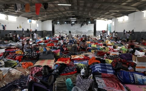 Migrants are seen at the Anti-Illegal Immigration Agency in Tajora shelter center in Tripoli, Libya April 24, 2019 - Credit: Ahmed Jadallah/REUTERS